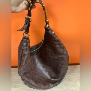 Gucci Monogram Embossed Leather Hobo